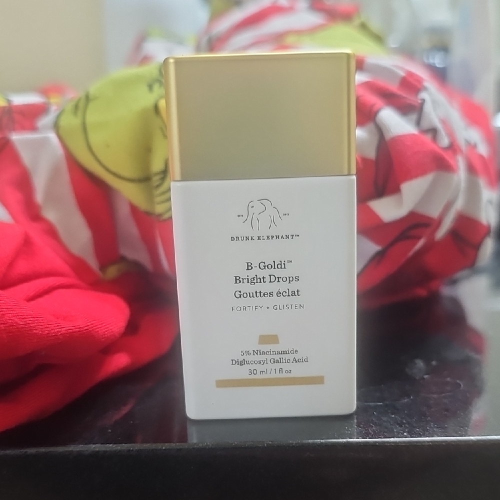 Drunk Elephant B-Goldi Bright Drops with White and Gold Design
